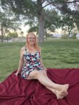 Nikki Lundberg relaxing outdoors while exploring how to improve your sex life