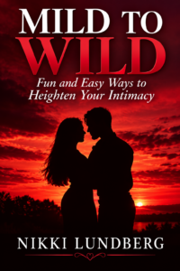 Mild To Wild book cover by Nikki Lundberg featuring a couple silhouetted against a red sunset.